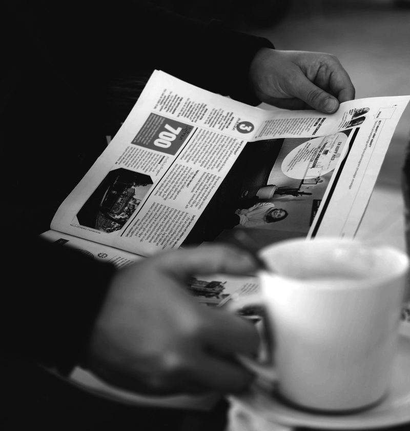 Man reading magazine at CCH